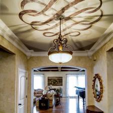 Entry hallway french plaster walls and faux metal ceiling design